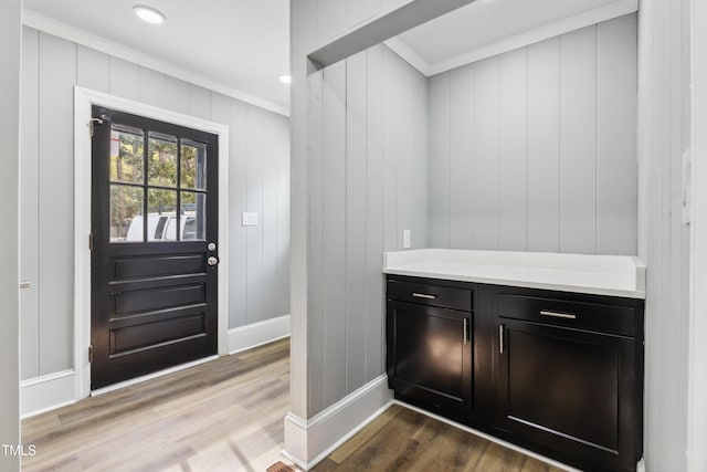 1112 Lakeside Dr NW, Wilson, NC 27896 - entrance foyer featuring dark wood-type flooring and ornamental molding