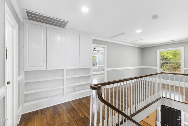 1112 Lakeside Dr NW, Wilson, NC 27896 - corridor with attic access, wood finished floors, an upstairs landing, recessed lighting, and ornamental molding