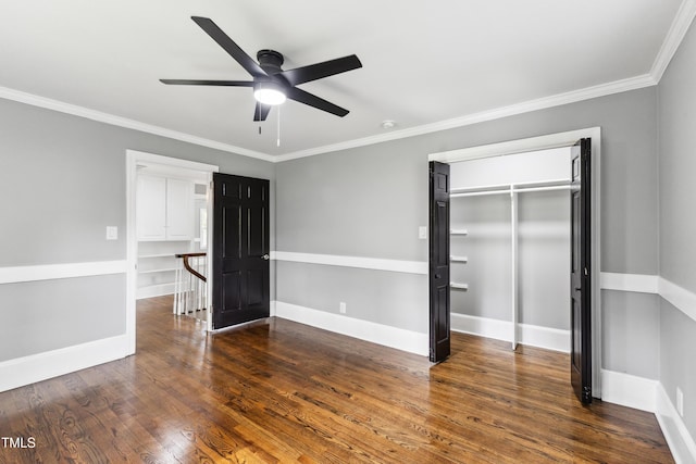 1112 Lakeside Dr NW, Wilson, NC 27896 - unfurnished bedroom featuring wood finished floors, crown molding, and ceiling fan
