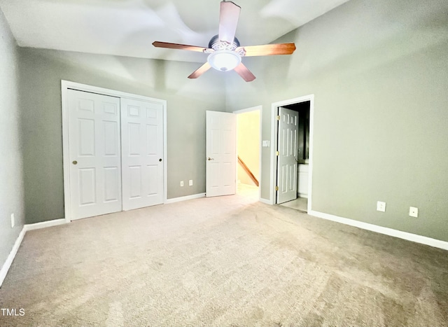5419 Vista View Ct, Raleigh, NC 27612 - unfurnished bedroom with carpet floors, a closet, ensuite bath, and vaulted ceiling