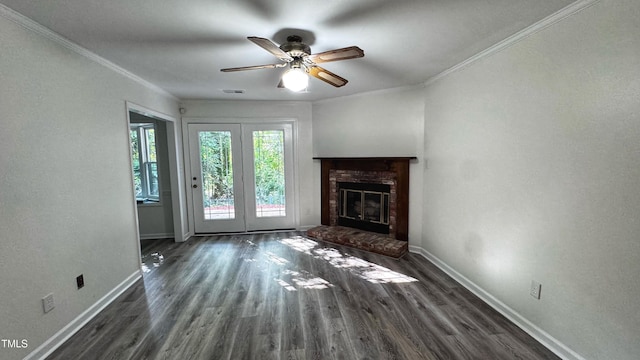 132 Carriage House Trl, Garner, NC 27529 - unfurnished living room featuring wood finished floors, a ceiling fan, a fireplace, and crown molding