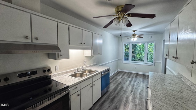132 Carriage House Trl, Garner, NC 27529 - kitchen featuring stainless steel appliances, exhaust hood, light countertops, dark wood finished floors, and ceiling fan