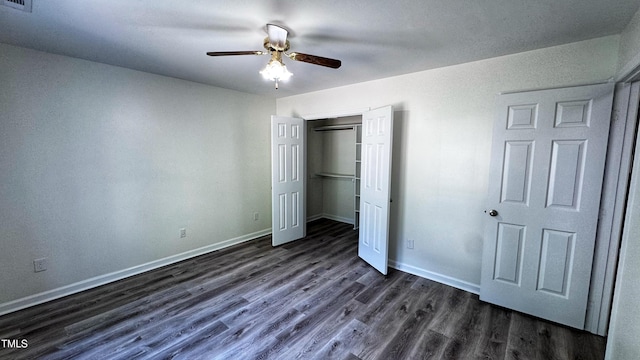 132 Carriage House Trl, Garner, NC 27529 - unfurnished bedroom featuring dark wood-style flooring, a closet, and a ceiling fan