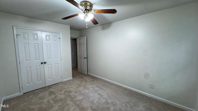 132 Carriage House Trl, Garner, NC 27529 - unfurnished bedroom with carpet flooring, a closet, and a ceiling fan