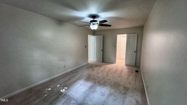 132 Carriage House Trl, Garner, NC 27529 - unfurnished bedroom featuring carpet, ceiling fan, and a textured wall