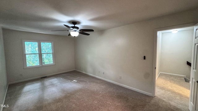 132 Carriage House Trl, Garner, NC 27529 - spare room with a ceiling fan and carpet floors