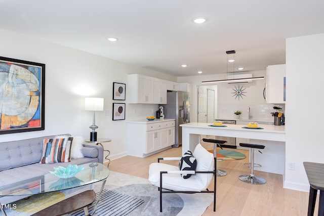 1309 Hudson Ave Unit D6, Durham, NC 27705 - living area with light wood-style flooring and recessed lighting