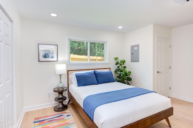 1309 Hudson Ave Unit D6, Durham, NC 27705 - bedroom with electric panel, light wood finished floors, and recessed lighting
