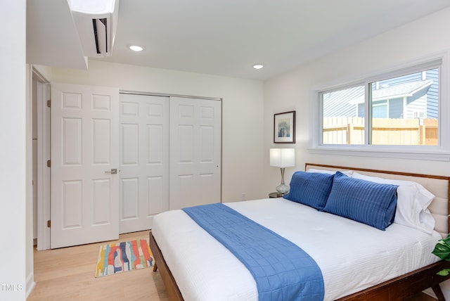 1309 Hudson Ave Unit D6, Durham, NC 27705 - bedroom featuring light wood finished floors, a closet, and recessed lighting