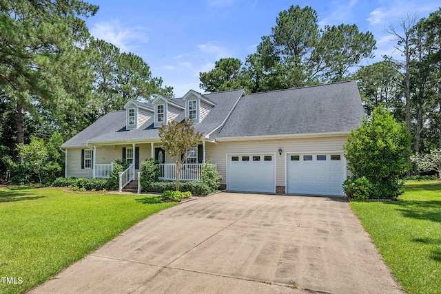 3109 Gold Dust Ln, Willow Springs, NC 27592 - cape cod home featuring an attached garage, a porch, concrete driveway, and a front yard