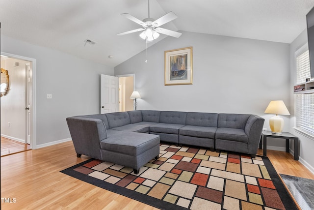 3109 Gold Dust Ln, Willow Springs, NC 27592 - living room with wood finished floors, ceiling fan, vaulted ceiling, and a chandelier