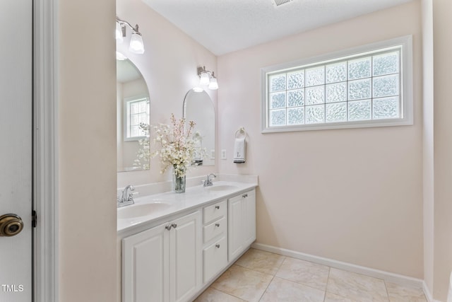 3109 Gold Dust Ln, Willow Springs, NC 27592 - full bath with healthy amount of natural light and double vanity