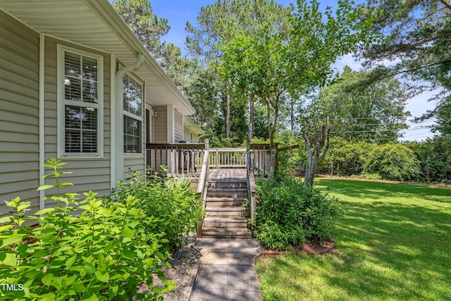 3109 Gold Dust Ln, Willow Springs, NC 27592 - view of green lawn with a wooden deck and stairs