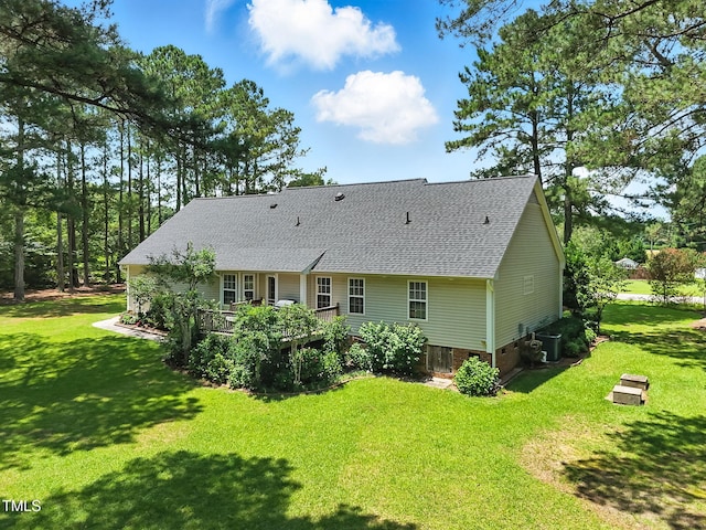 3109 Gold Dust Ln, Willow Springs, NC 27592 - rear view of property featuring roof with shingles, a lawn, and crawl space