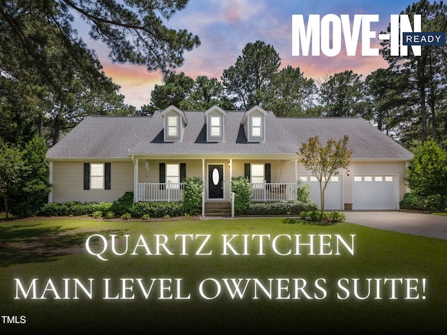 3109 Gold Dust Ln, Willow Springs, NC 27592 - view of front facade featuring a yard, covered porch, driveway, a garage, and roof with shingles