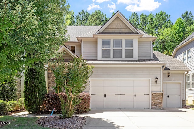 1413 Lily Creek Dr, Cary, NC 27518 - craftsman house with a shingled roof, concrete driveway, stone siding, and a garage