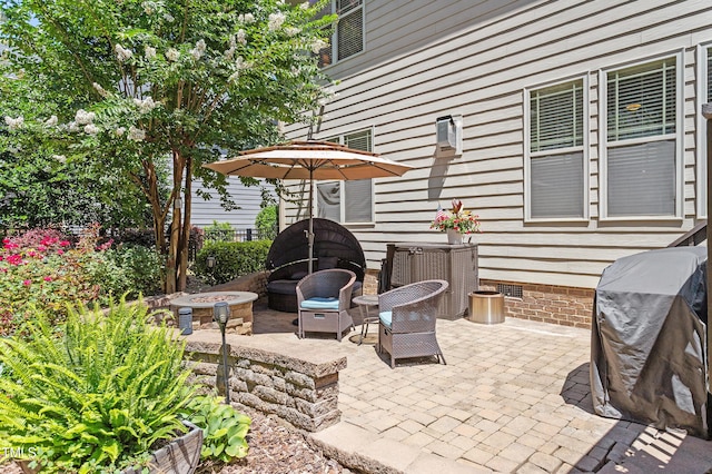 1413 Lily Creek Dr, Cary, NC 27518 - view of patio with an outdoor fire pit and area for grilling