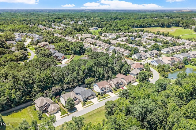 1413 Lily Creek Dr, Cary, NC 27518 - aerial overview of property's location with nearby suburban area and a nearby body of water