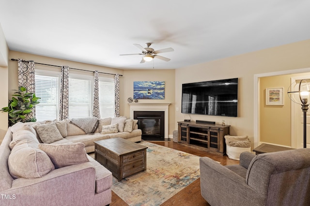 1413 Lily Creek Dr, Cary, NC 27518 - living area with ceiling fan, a glass covered fireplace, and wood finished floors
