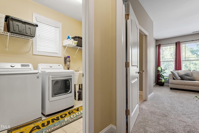 1413 Lily Creek Dr, Cary, NC 27518 - laundry area with washing machine and clothes dryer and carpet
