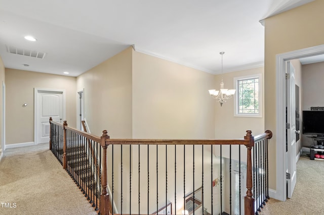 1413 Lily Creek Dr, Cary, NC 27518 - hall featuring an upstairs landing, light carpet, a chandelier, ornamental molding, and recessed lighting