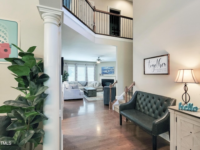 1413 Lily Creek Dr, Cary, NC 27518 - corridor with wood finished floors, a towering ceiling, and ornate columns