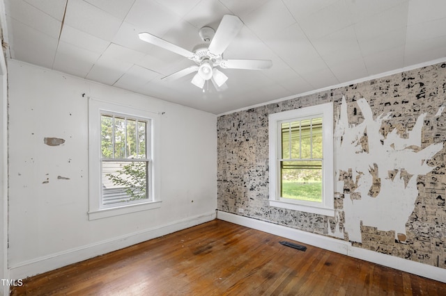 2715 E Geer St, Durham, NC 27704 - spare room with plenty of natural light, hardwood / wood-style floors, a ceiling fan, and crown molding