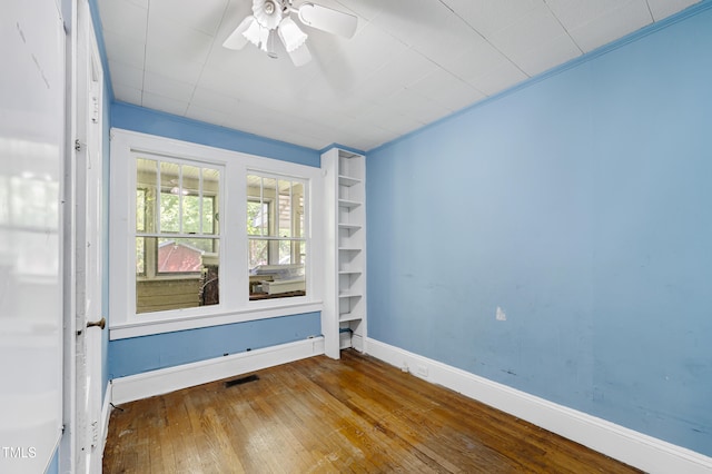 2715 E Geer St, Durham, NC 27704 - empty room with hardwood / wood-style flooring and ceiling fan