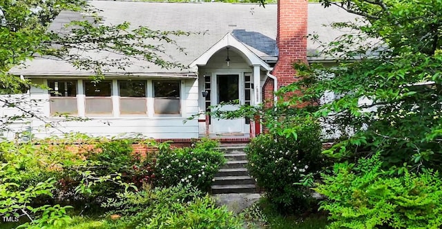 2715 E Geer St, Durham, NC 27704 - view of front facade featuring a chimney