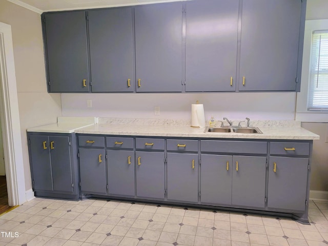 411 W Raleigh St, Siler City, NC 27344 - kitchen with light countertops and crown molding