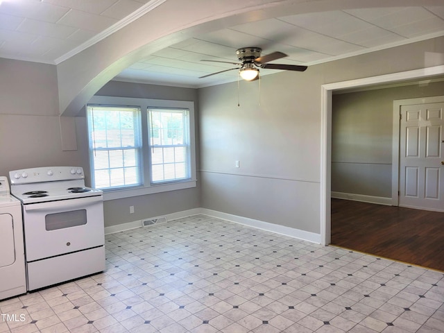 411 W Raleigh St, Siler City, NC 27344 - kitchen with electric range, crown molding, washer / clothes dryer, ceiling fan, and arched walkways