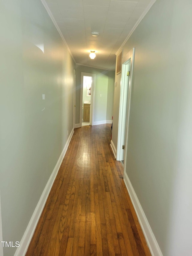 411 W Raleigh St, Siler City, NC 27344 - corridor featuring ornamental molding and dark wood-type flooring