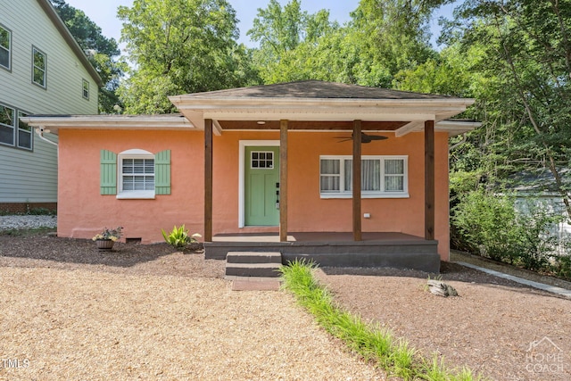 309 E End Ave, Durham, NC 27703 - view of front facade featuring stucco siding, a ceiling fan, and a porch