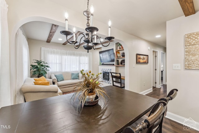 309 E End Ave, Durham, NC 27703 - dining area featuring arched walkways, a chandelier, beamed ceiling, dark wood-style flooring, and recessed lighting