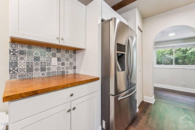 309 E End Ave, Durham, NC 27703 - kitchen with stainless steel refrigerator with ice dispenser, butcher block counters, arched walkways, and dark wood-style flooring