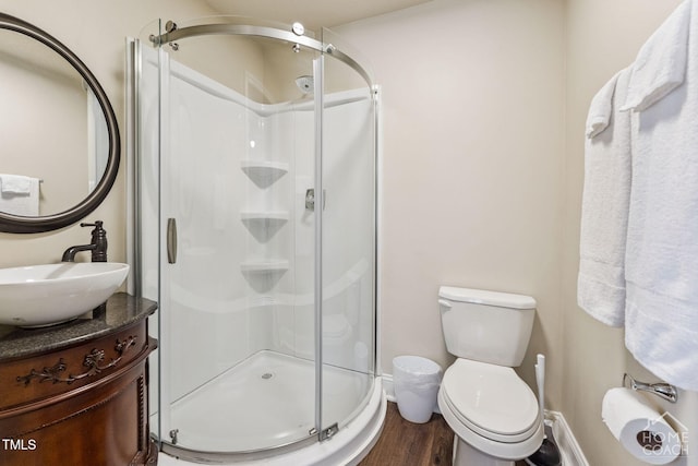 309 E End Ave, Durham, NC 27703 - bathroom featuring a shower stall, vanity, and wood finished floors