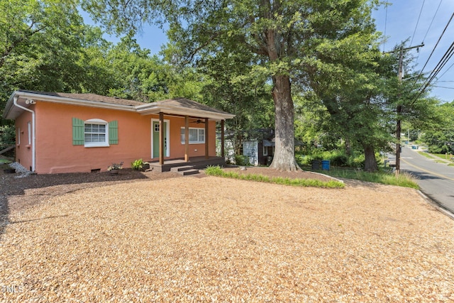 309 E End Ave, Durham, NC 27703 - view of front of home with covered porch, stucco siding, and a ceiling fan