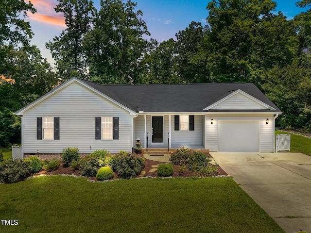 200 Cornerstone Dr, Franklinton, NC 27525 - single story home with a garage, concrete driveway, and a yard