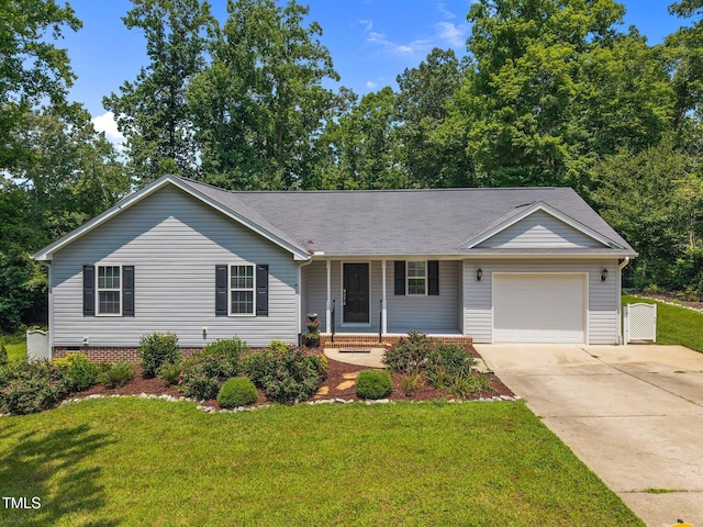 200 Cornerstone Dr, Franklinton, NC 27525 - single story home featuring driveway, a garage, a front lawn, and covered porch