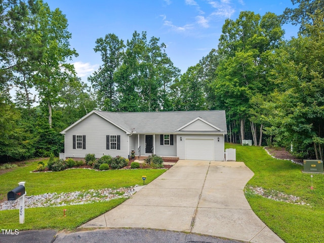 200 Cornerstone Dr, Franklinton, NC 27525 - view of front of home with an attached garage, driveway, and a front yard