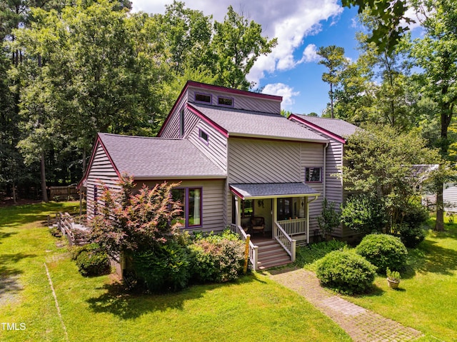 206 Lisa Dr, Carrboro, NC 27510 - mid-century home with roof with shingles, a front lawn, and covered porch