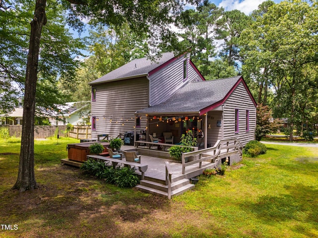 206 Lisa Dr, Carrboro, NC 27510 - back of property with roof with shingles, a wooden deck, and a hot tub