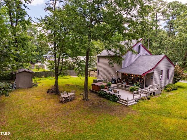 206 Lisa Dr, Carrboro, NC 27510 - view of yard featuring a storage unit and a deck