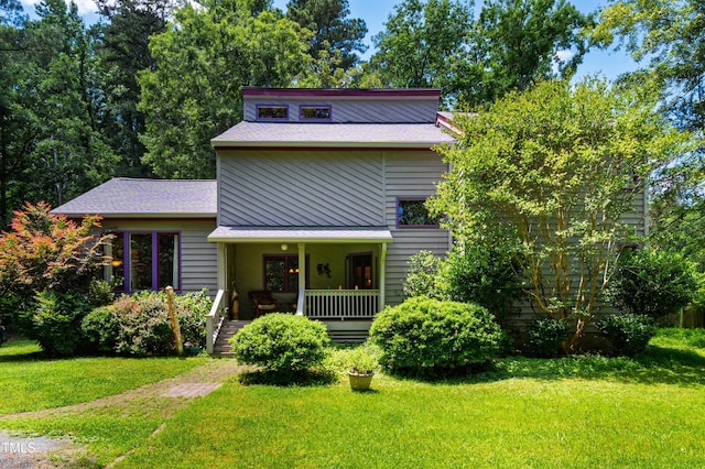 206 Lisa Dr, Carrboro, NC 27510 - mid-century modern home with a front lawn and a porch