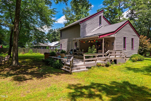 206 Lisa Dr, Carrboro, NC 27510 - back of property with a deck and roof with shingles