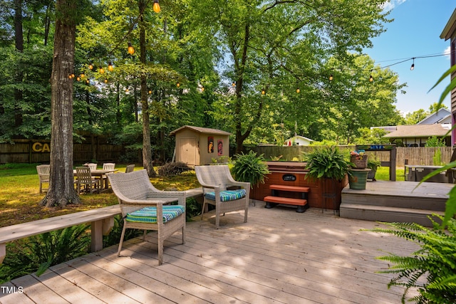 206 Lisa Dr, Carrboro, NC 27510 - wooden deck featuring a storage shed, a fenced backyard, and a hot tub