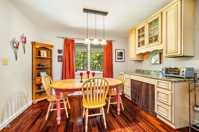 206 Lisa Dr, Carrboro, NC 27510 - dining area featuring dark wood-type flooring and baseboards