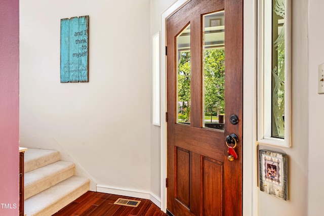 206 Lisa Dr, Carrboro, NC 27510 - entrance foyer with dark wood-style flooring and stairway
