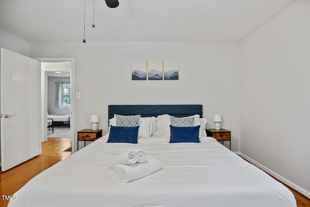 619 Ashe Ave, Cary, NC 27511 - bedroom with wood finished floors and baseboards