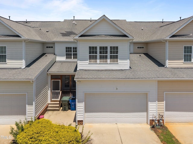 1012 Palace Garden Way, Raleigh, NC 27603 - view of front facade featuring roof with shingles, concrete driveway, and an attached garage